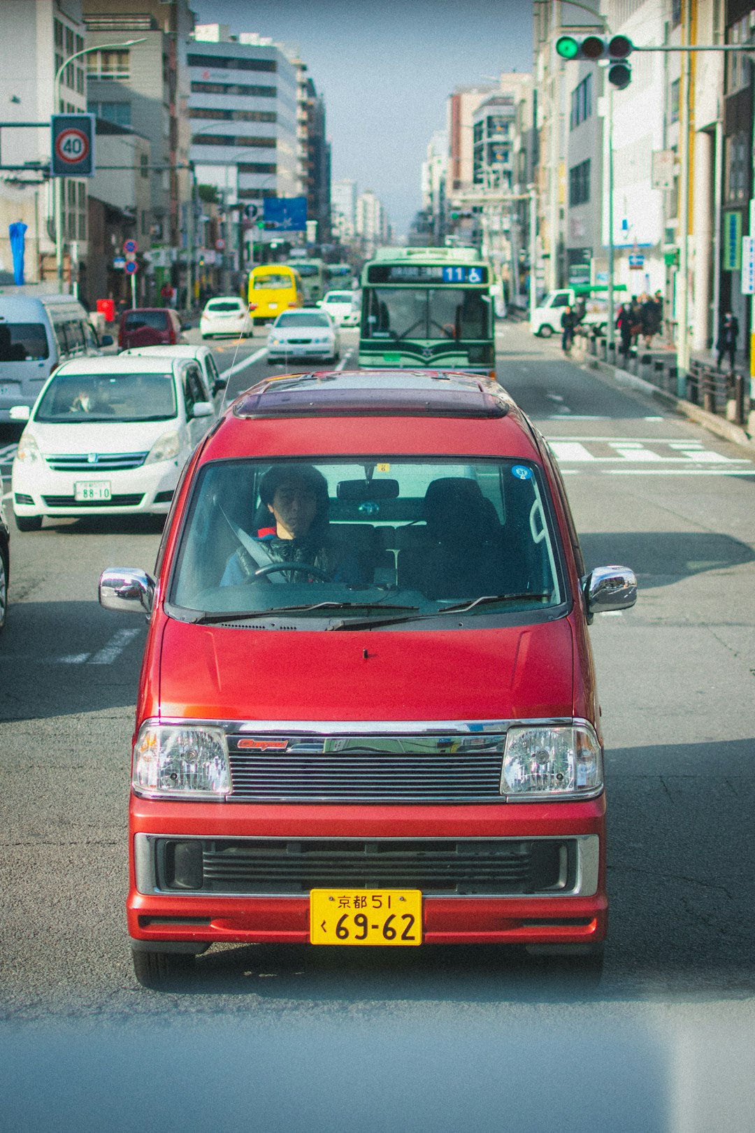 red car on the road