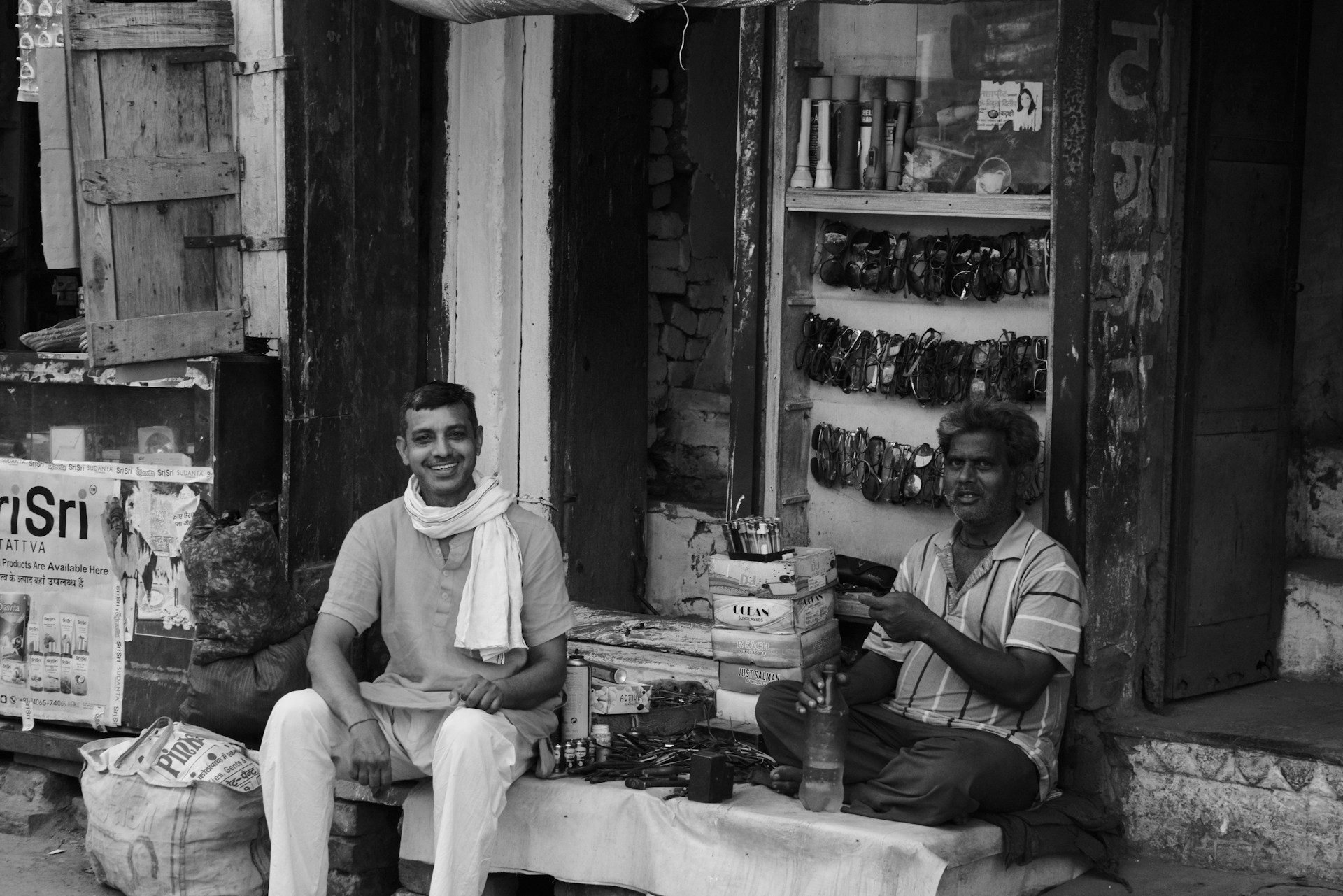 man in white long sleeve shirt sitting on chair