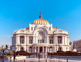 white concrete building under blue sky during daytime