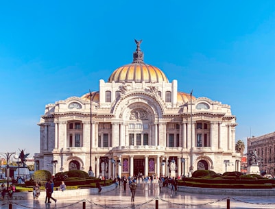 white concrete building under blue sky during daytime