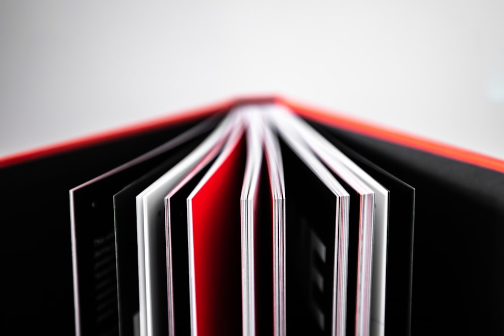 black red and white striped textile