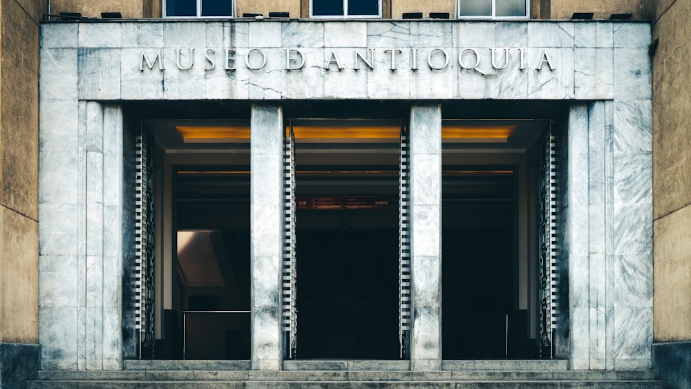 gray concrete building with glass windows