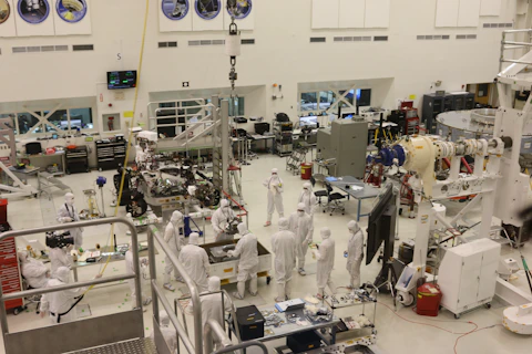 Precision white aerospace equipment in clean facility