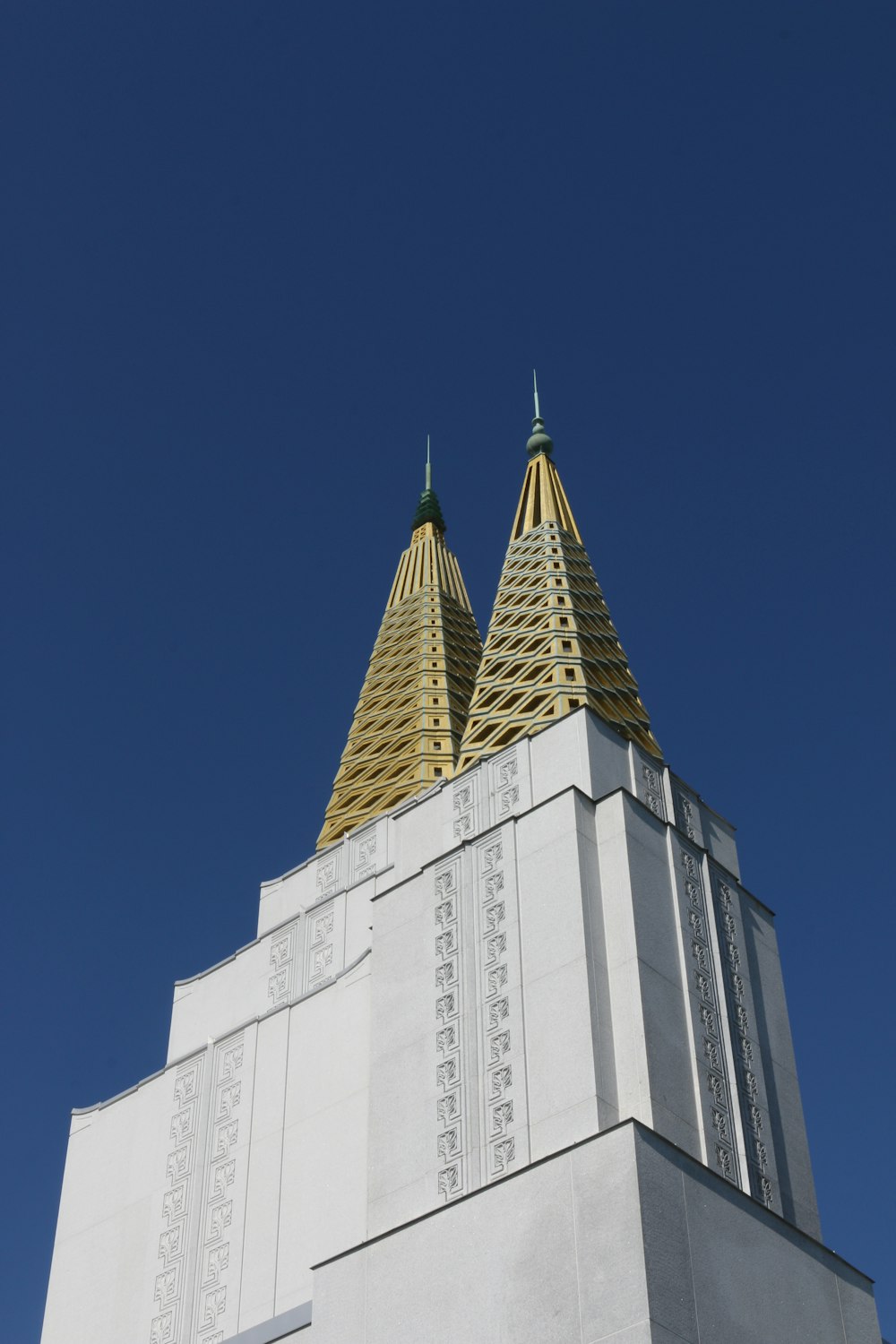 white concrete building under blue sky during daytime