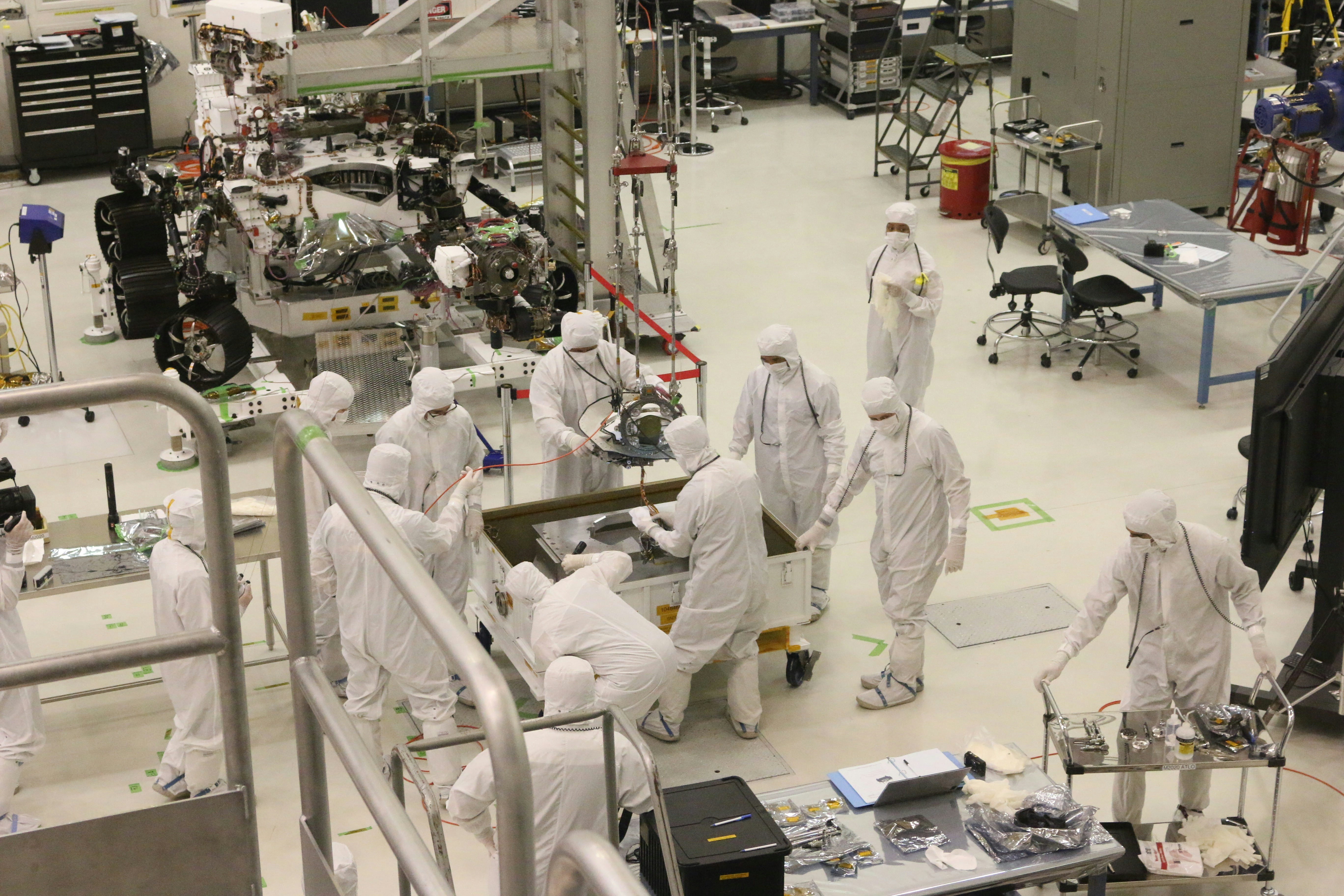 commercial satellite assembly cleanroom technicians