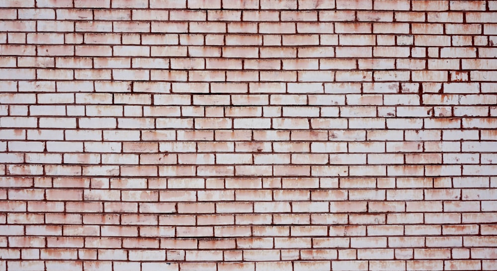 brown brick wall during daytime