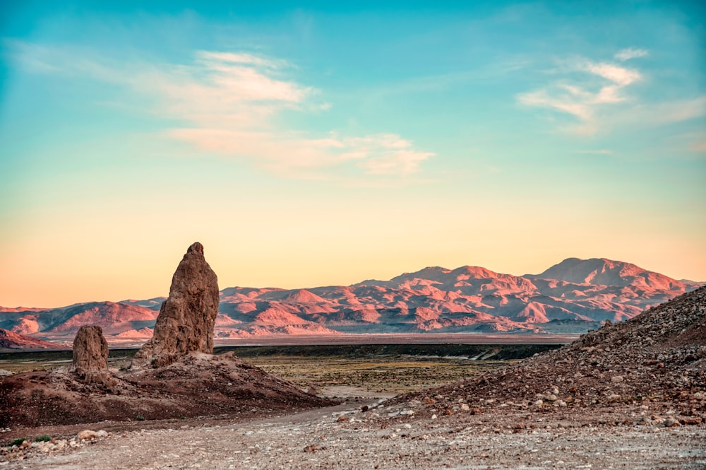 brown rock formation under blue sky during daytime