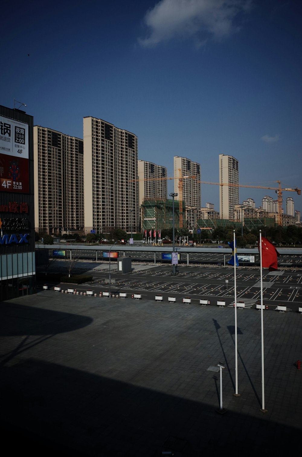 city buildings under blue sky during daytime