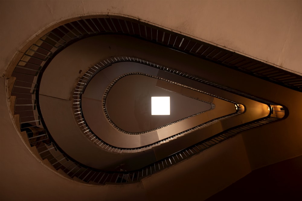 brown and white spiral staircase