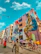 A vibrant street scene with colorful murals and people walking by in the golden hour.