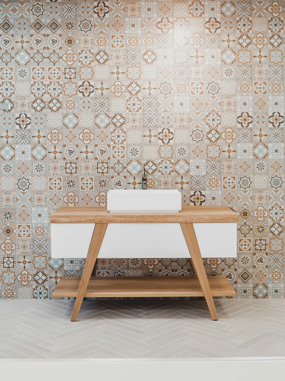 brown wooden table beside white and black wall