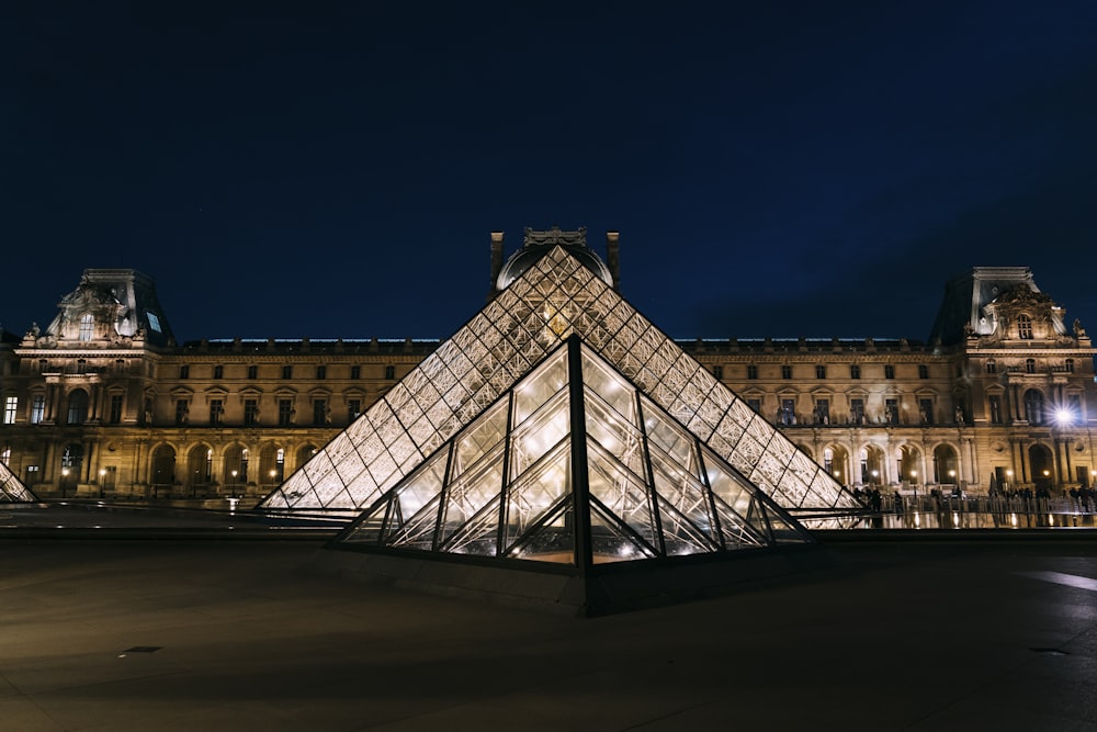 white and black pyramid under blue sky during night time