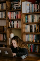 Woman tutoring with a laptop in virtual teaching session free tutoring