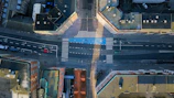 Aerial view of busy Lombardy roads with Velolombardia truck in motion.