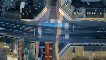 Close-up of a computer screen showing detailed bounding boxes around vehicles and pedestrians.