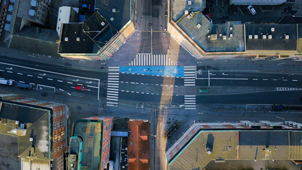 Close-up of a computer screen showing detailed bounding boxes around vehicles and pedestrians.