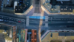 Researchers analyzing traffic patterns on urban streets with digital tools