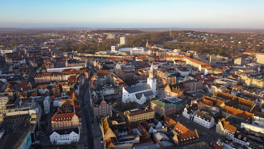 aerial view of city buildings during daytime in Aalborg Centrum Denmark