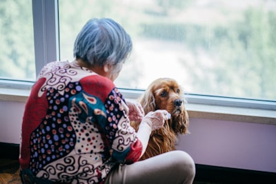 Senior enjoying time with a pet