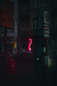 red and white open neon signage