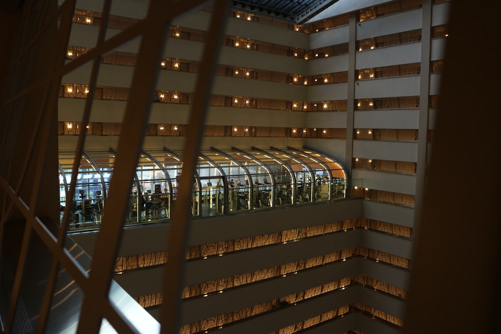 brown wooden stairs with glass windows