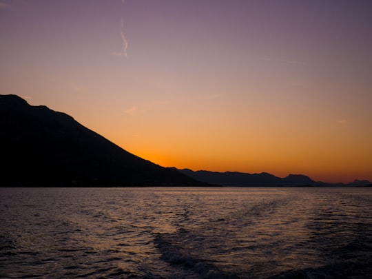 silhouette of mountain during sunset in Šibenik Croatia