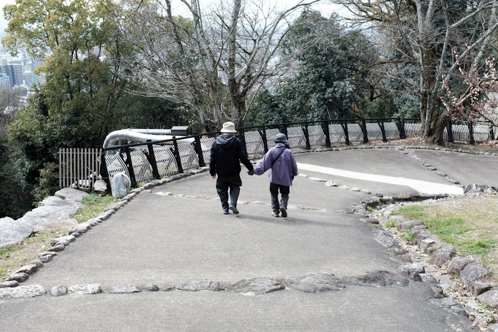 people walking on sidewalk during daytime