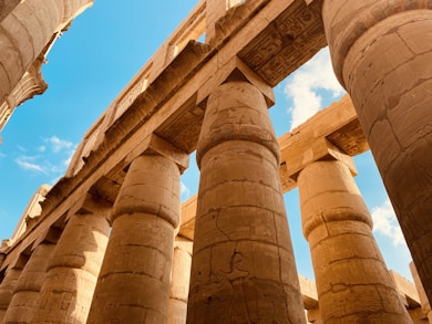 brown concrete pillars under blue sky during daytime
