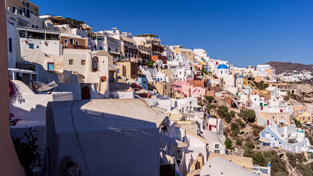 white and brown concrete buildings under blue sky during daytime