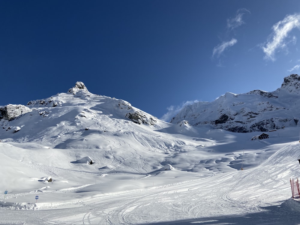 snow covered mountain under blue sky during daytime