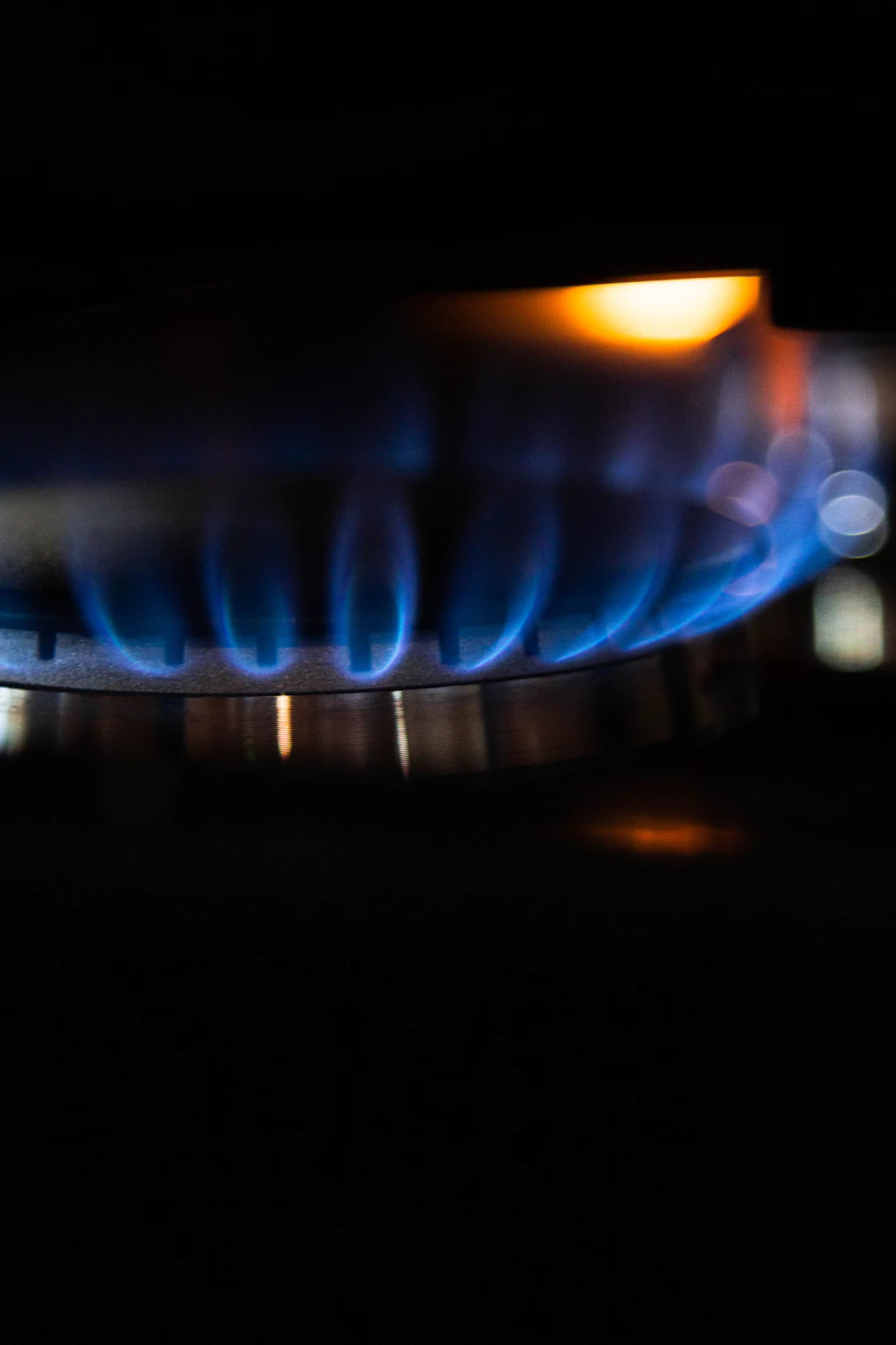 A blue gas flame burning steadily, a sign of a clean, safe system