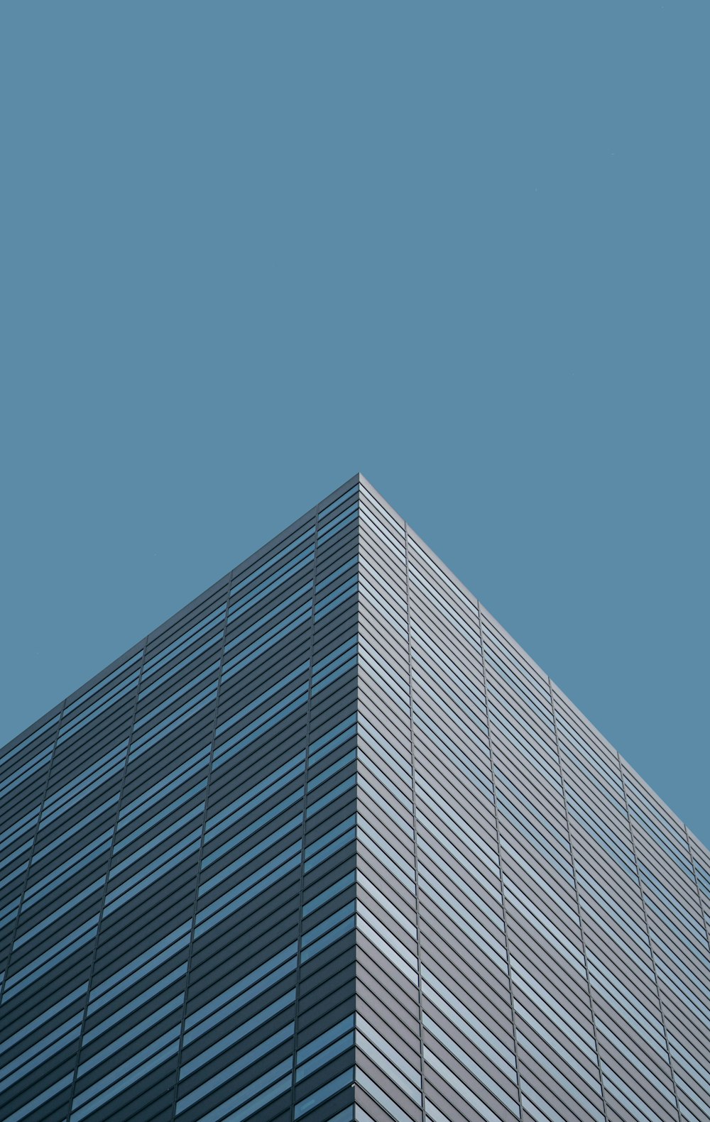 gray concrete building under blue sky during daytime