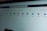 A computer screen displays a webpage featuring a row of icons for various applications such as OneNote, SharePoint, Teams, Sway, and Yammer. The phrase 'Office installieren' is visible on the right side of the screen.