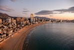 city skyline near body of water during daytime