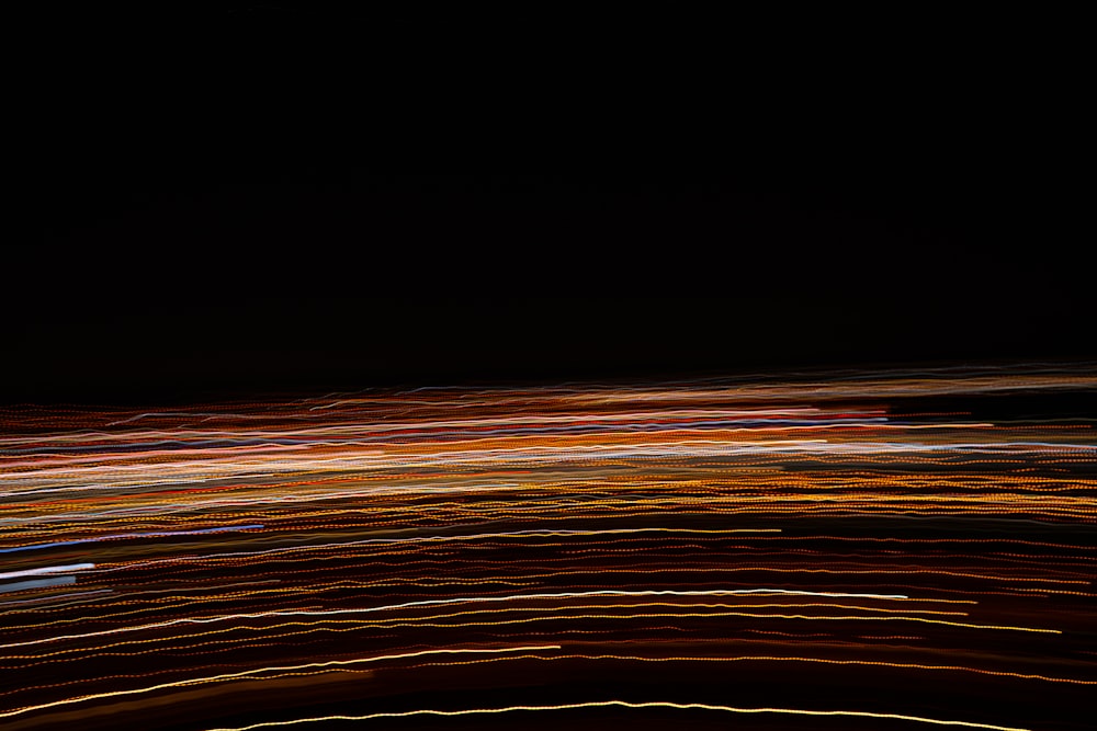 time lapse photography of orange lights