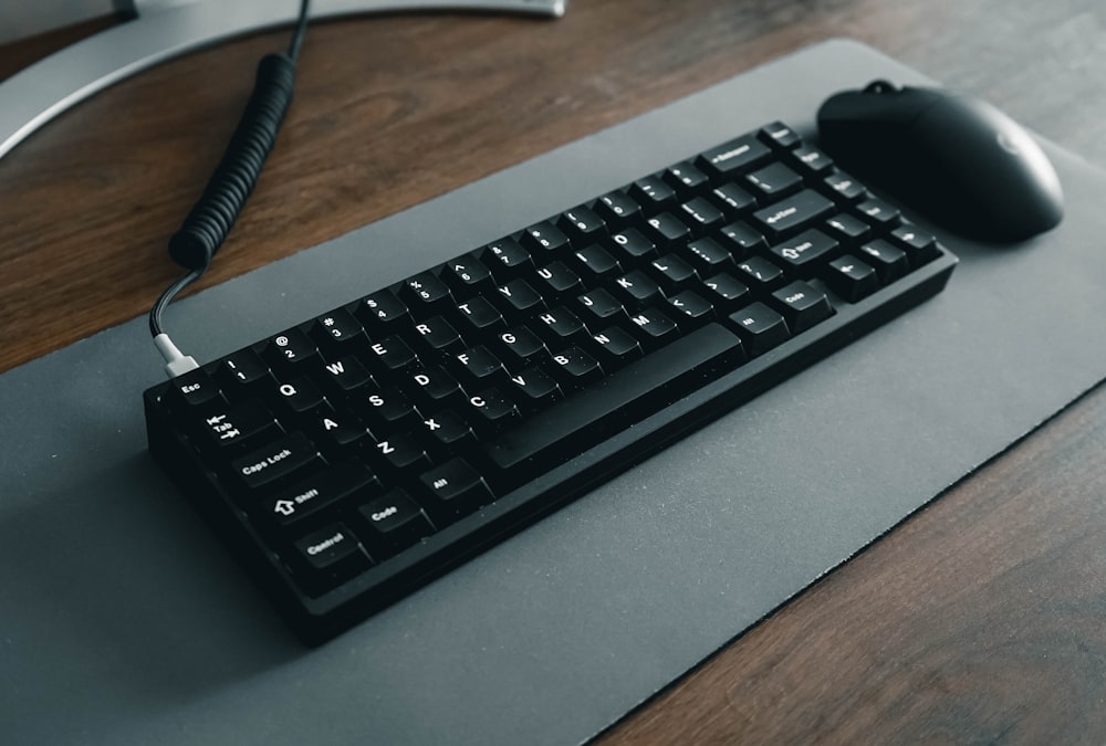 black computer keyboard on gray table