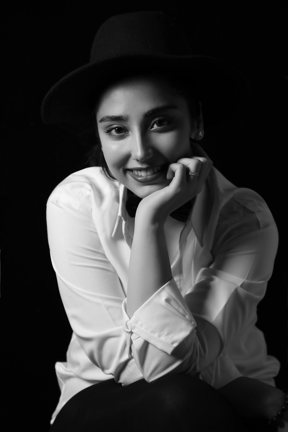 woman in white long sleeve shirt