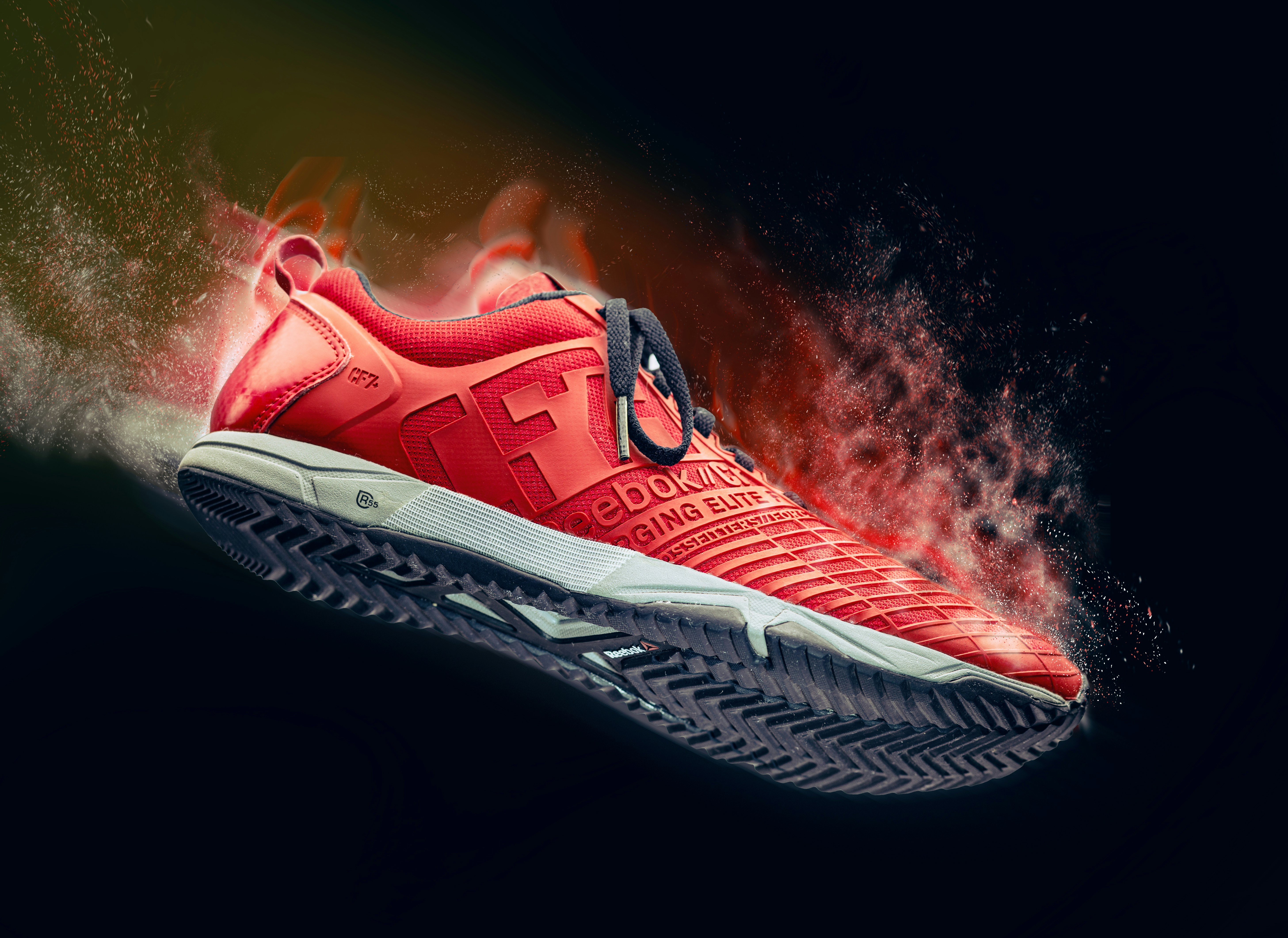 red and white nike athletic shoe