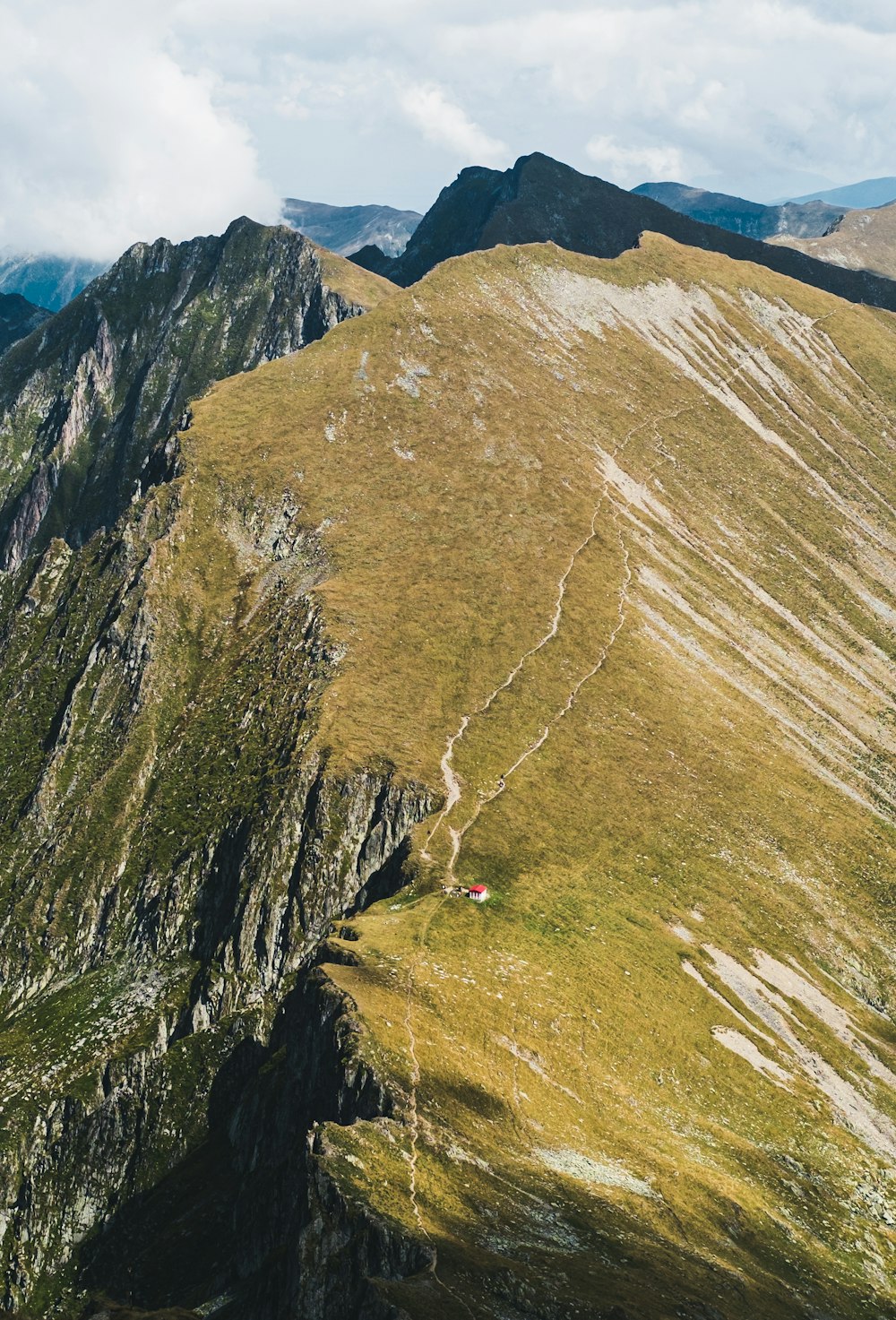 green and brown mountain under blue sky during daytime