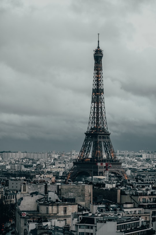 eiffel tower under gray cloudy sky during daytime in Arc de Triomphe France