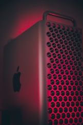 silver ipad on red textile