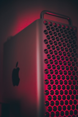 silver ipad on red textile