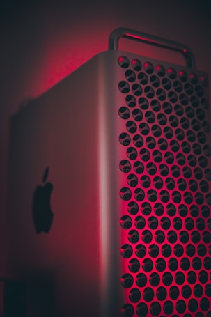 silver ipad on red textile