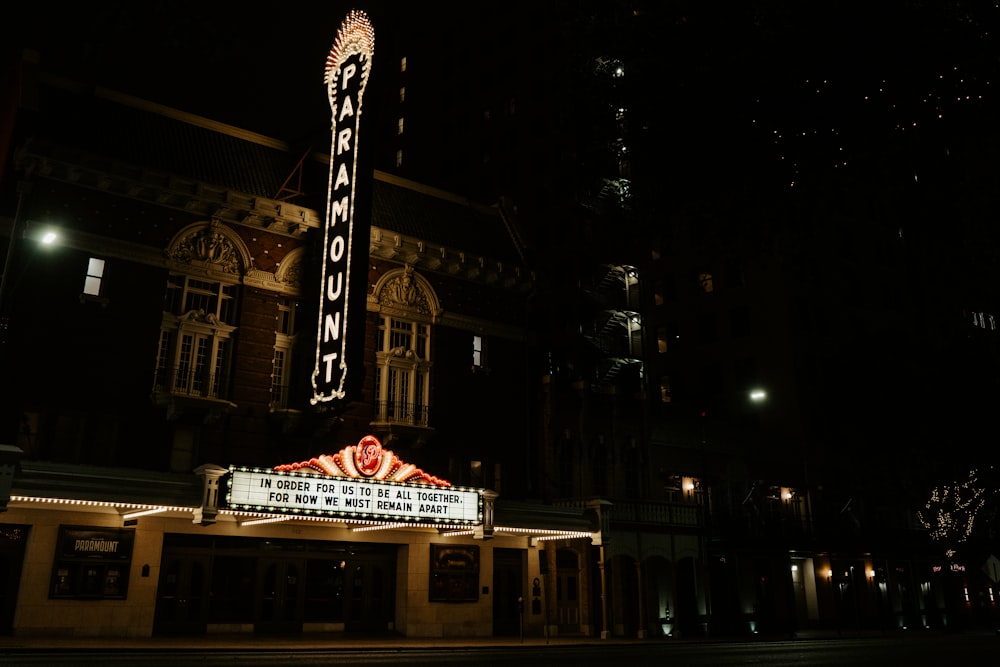 white and red chicago building during night time