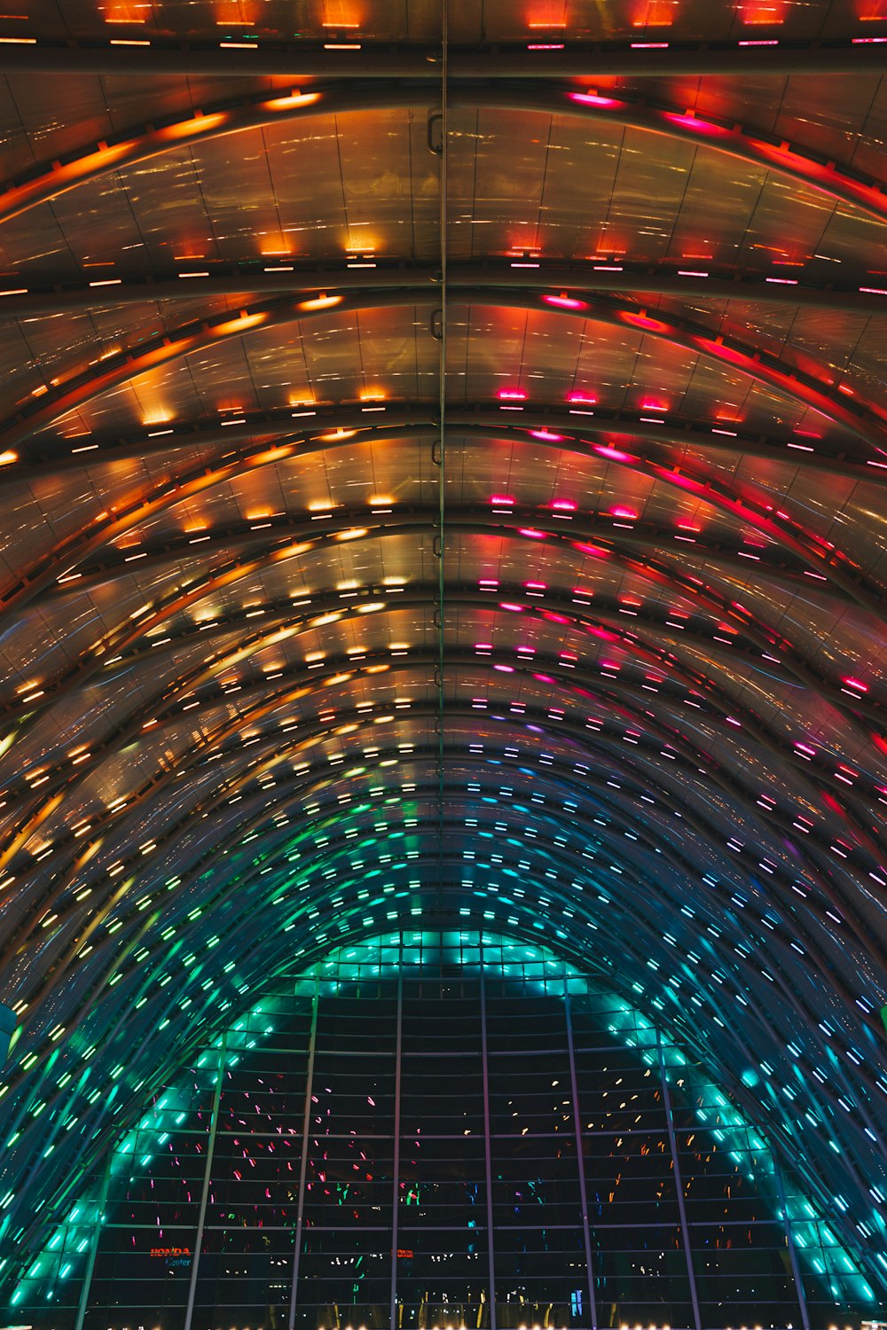 brown and blue tunnel with lights