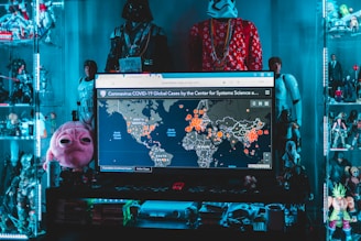 black flat screen tv turned on displaying man in black and red jacket