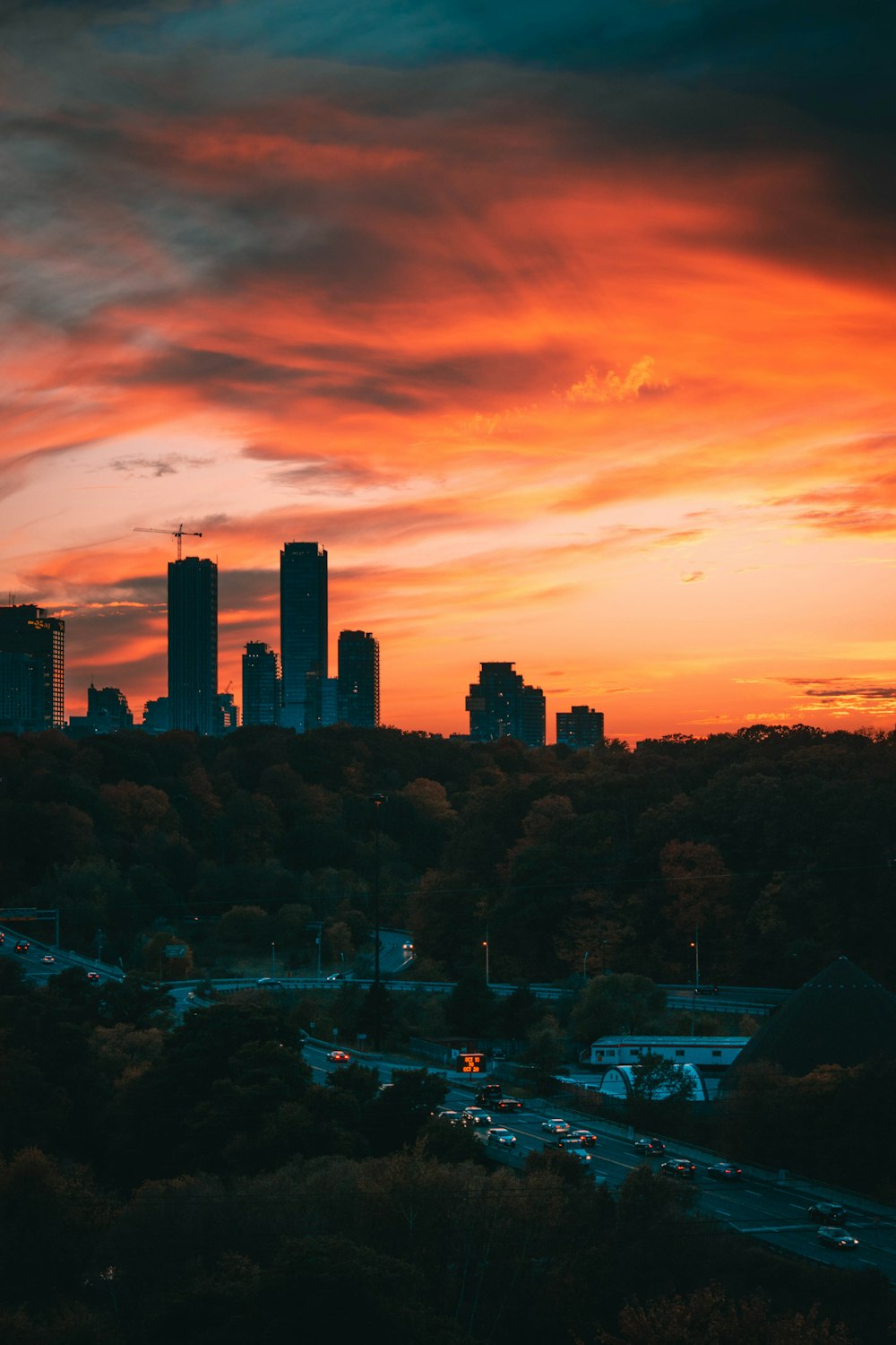 city skyline during orange sunset