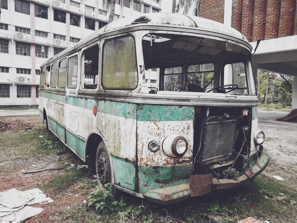 white and orange bus on road during daytime