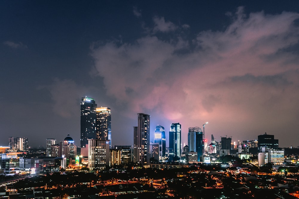 city skyline during night time