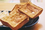 toasted bread on black round plate